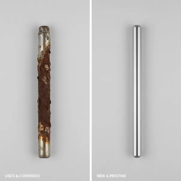 Side-by-side comparison of a severely corroded old anode rod and a brand new, clean anode rod.