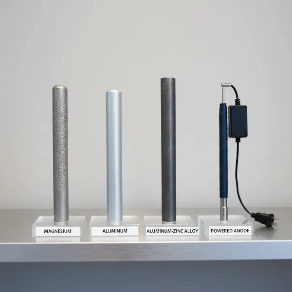 A collection of various water heater anode rods, including magnesium, aluminum, aluminum-zinc, and powered types.